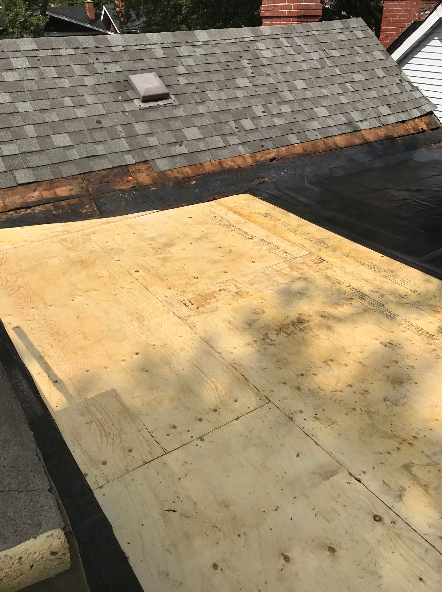 Fully adhered EPDM membrane on flat roof Toronto Roofing Repair Company Residential
