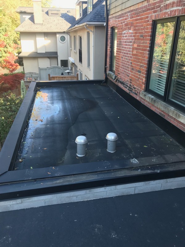 Extruded Aluminum Breather Vents On Flat Roof In Toronto Metro Roofing