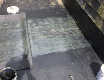 EPDM membrane flat roof repair and installation service by Metro Roofing