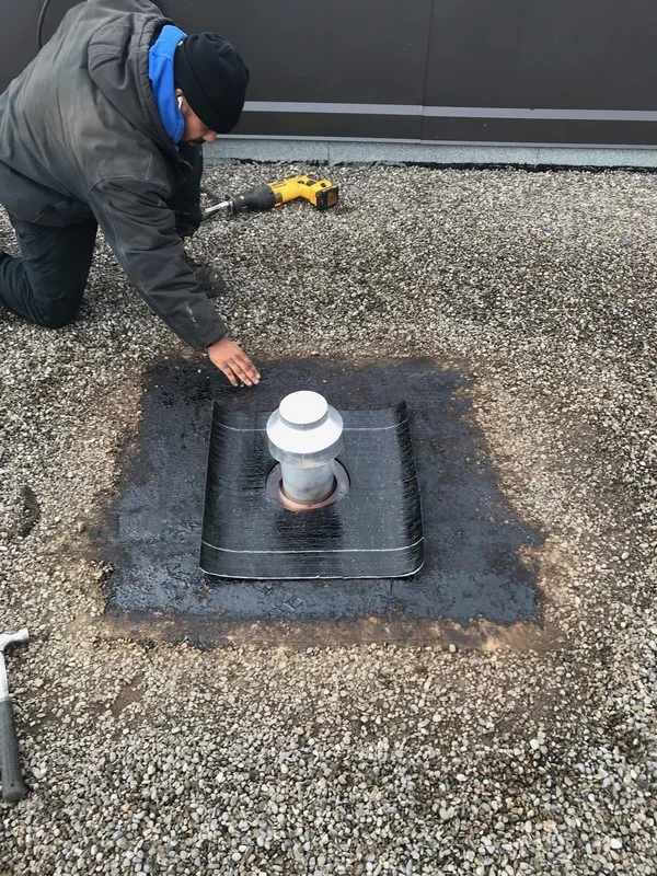 Roof leak being repaired by Metro Roofing in Ajax Ontario