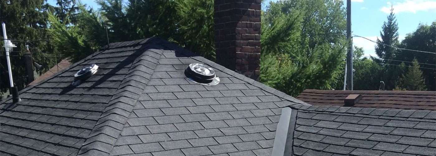 Flat roof repair being performed on a commercial building in Ajax Ontario