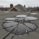 Damaged flat roof membrane with ponding water in Ajax Ontario