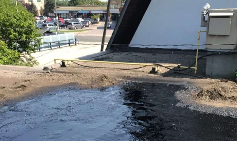 Metro Roofing team completing a roof installation in Ajax Ontario